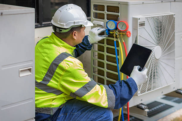 Professional Heat Pump Repair technician working in Arcade, GA